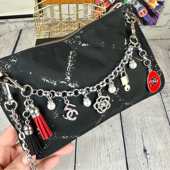 CHANEL black nylon pouch crossbody with chain, bag charm and authenticit⦠- Picture 4 of 12